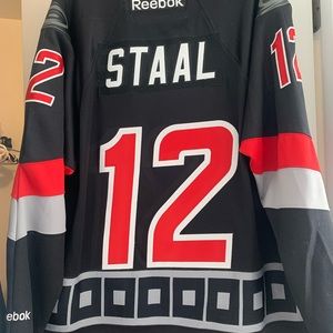 NWOT mens NHL Carolina Hurricanes training Jersey Staal #12 size L